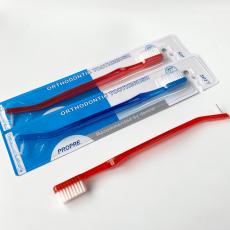 Double ended denture interdental brush